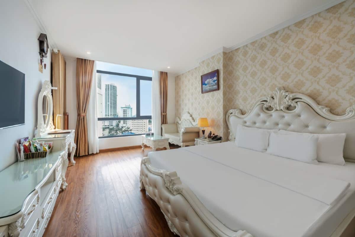 Deluxe Suite Double or Twin | Een minibar, een kluis op de kamer, een strijkplank/strijkijzer