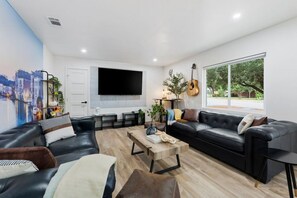 Smart TV, ping pong, computer monitors - Italy Inspired | Mini Volleyball | Ping-Pong | Yoga (Austin)
