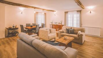 Comfort House | Living area | 33-inch LCD TV with cable channels