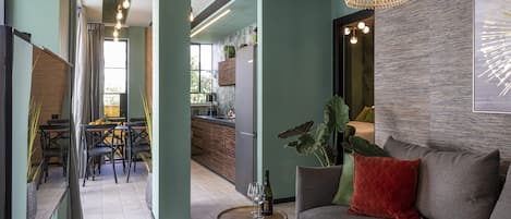 Deluxe Apartment, Balcony | Living area