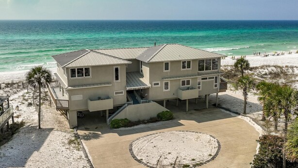 A two-story beachfront house with a patio and a circular garden, overlooking the ocean. - Gulf-Front with Private Deck and Water Views (Miramar Beach)