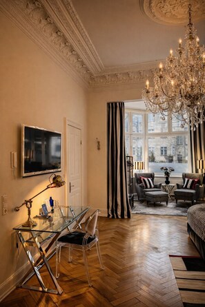 Deluxe Junior Suite with Garden | Living area | 50-inch flat-screen TV with cable channels, TV
