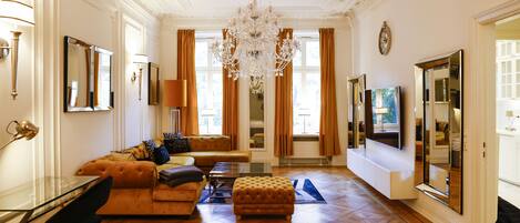 Deluxe Junior Suite with Garden | Living area | 50-inch flat-screen TV with cable channels, TV