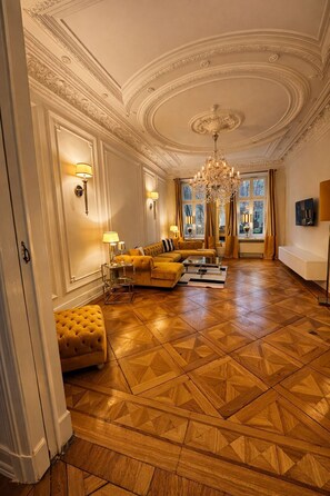 Deluxe Junior Suite with Garden | Living area | 50-inch flat-screen TV with cable channels, TV