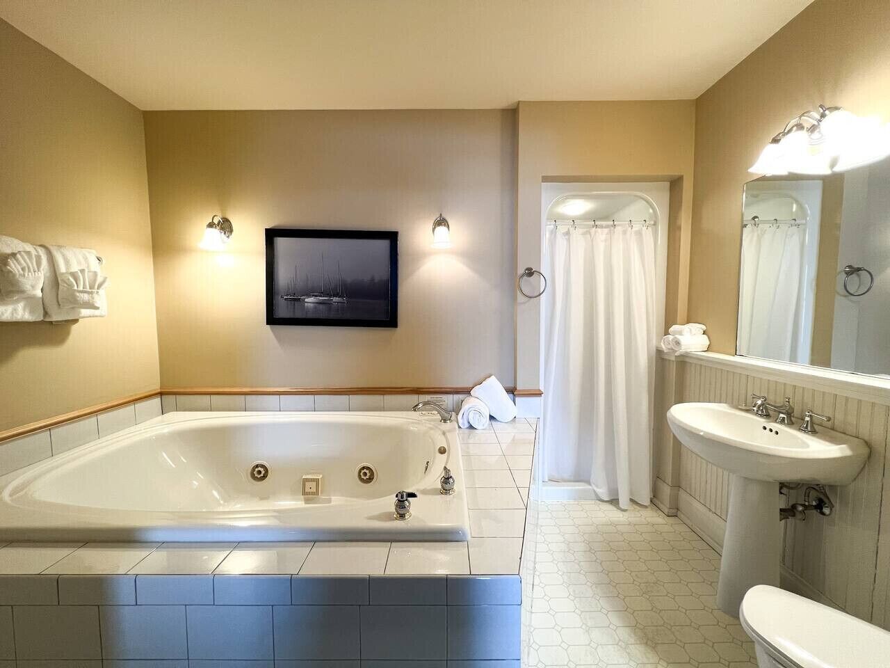 Bathtub, hair dryer, towels