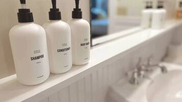 Bathtub, hair dryer, towels