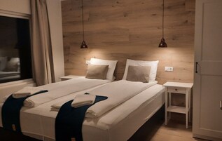 Apartamento | Ropa de cama hipoalergénica y cortinas opacas