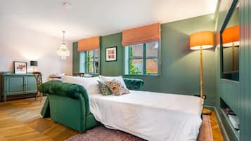 1 bedroom, desk, iron/ironing board, travel crib