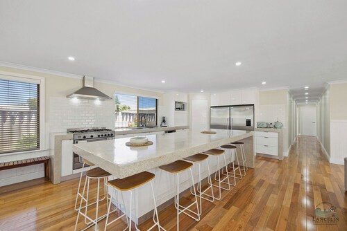 A modern & stunning 8-bedroom home - perfect for larger or multiple families.