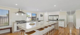 A modern & stunning 8-bedroom home - perfect for larger or multiple families.