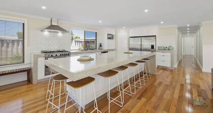 A modern & stunning 8-bedroom home - perfect for larger or multiple families.