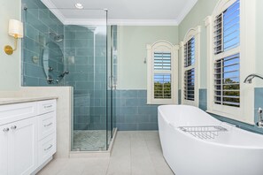 Bathtub, hair dryer, towels