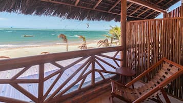 Habitación Deluxe, 1 cama Queen size, balcón, vista al mar | Vista a la playa o el mar