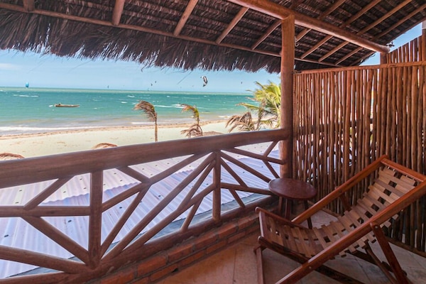 Habitación Deluxe, 1 cama Queen size, balcón, vista al mar | Vista a la playa o el mar