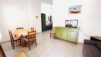 Apartment | Living area | 22-inch flat-screen TV with cable channels, TV