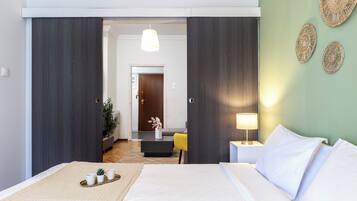 4 slaapkamers, geluiddichte muren, een strijkplank/strijkijzer