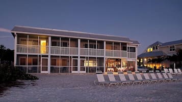 Enjoy stunning ocean views from the upper-floor balcony or relax on the beach with lounge chairs.