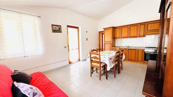 Apartment | Living area | 22-inch flat-screen TV with cable channels, TV