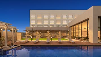 Outdoor pool, open 6:30 AM to 7:00 PM, pool umbrellas, sun loungers