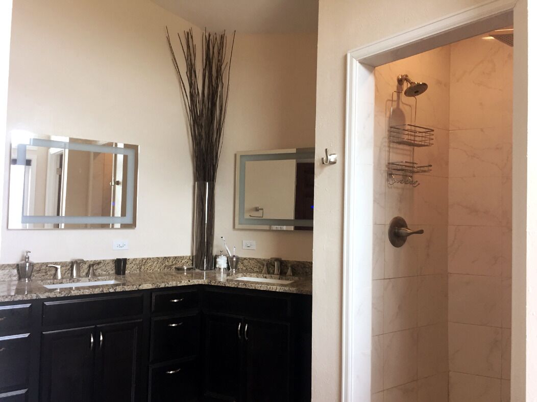 Bathtub, jetted bath, hair dryer, towels