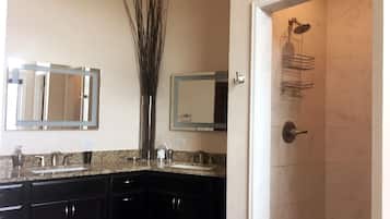 Bathtub, jetted bath, hair dryer, towels