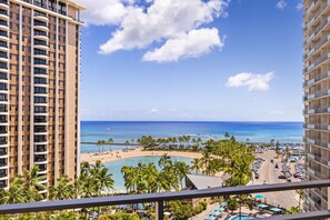 A high-rise hotel overlooking a beach with a clear view of the ocean and a pool area. - 1016 · Ilikai Collection # 4. Amazing views, beachfront. (Honolulu)