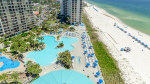 A resort with a large pool, beach, and multiple buildings. - Beach Blessings Edgewater 0602T2 Beautiful condo with Beautiful views! (Panama City Beach)