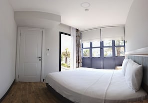 Chambre Deluxe | Literie de qualité, couette en duvet, minibar, décor unique