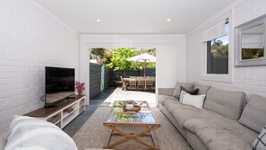 Smart TV, fireplace, books