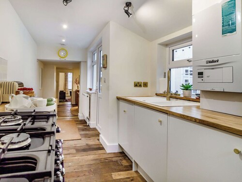 The Yellow Cottage On The Hill