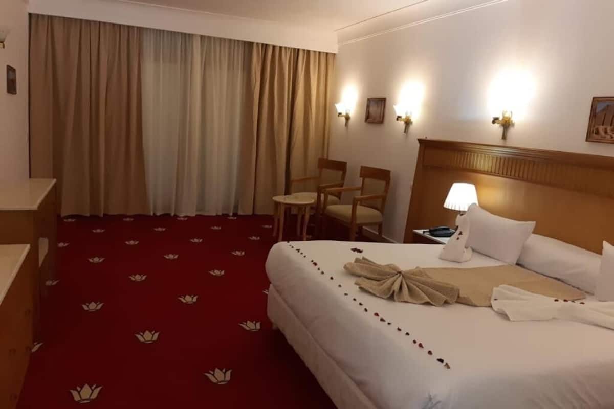 Deluxe-værelse | Egyptiske bomuldslagner, premium-sengetøj, Select Comfort-senge