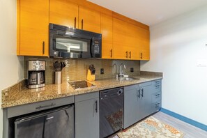 Microwave, stovetop, dishwasher, coffee/tea maker