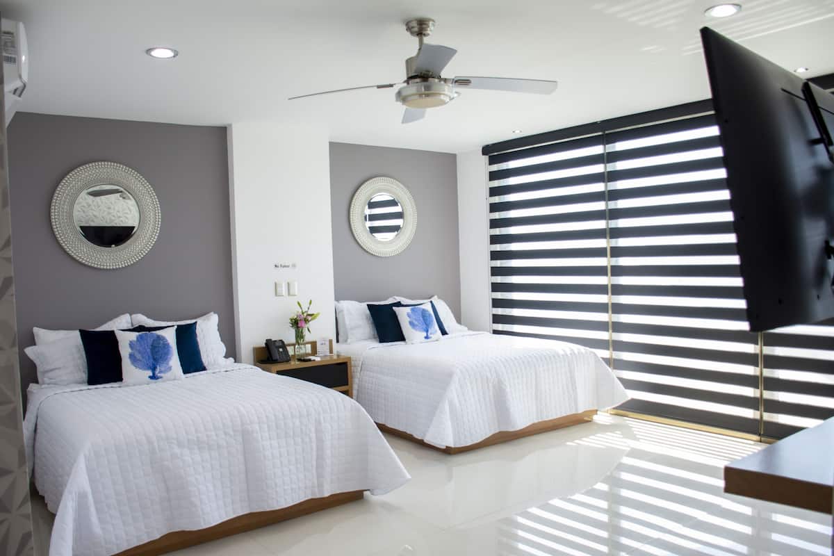 Luxury Room, 2 Queen Beds | 1 bedroom, down duvets, Select Comfort beds, individually decorated