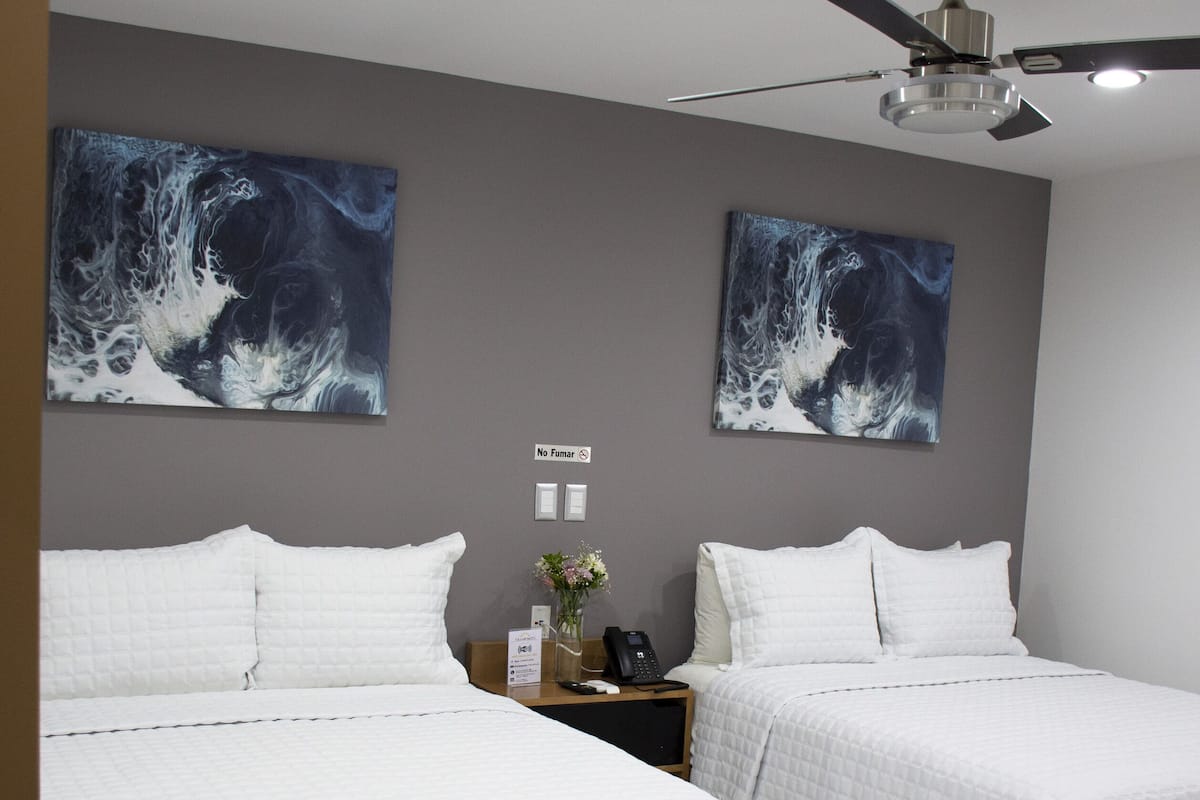 Standard Room, 2 Queen Beds | 1 bedroom, down duvets, Select Comfort beds, individually decorated