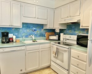 Fridge, microwave, oven, stovetop - Condo in Atlantic Beach, NC -Hungerford's Haven (Atlantic Beach)