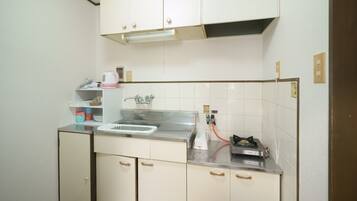 Fridge, microwave, stovetop, cookware/dishes/utensils