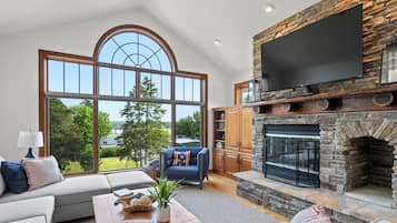 Smart TV, fireplace, table tennis, books