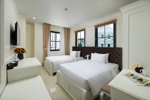 Quarto duplo luxo, vista para o jardim | Roupas de cama premium, frigobar, escrivaninha