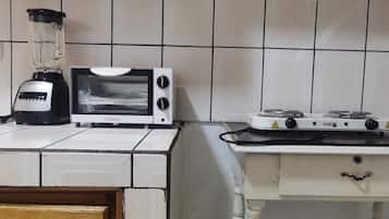 Microwave, blender, dining tables