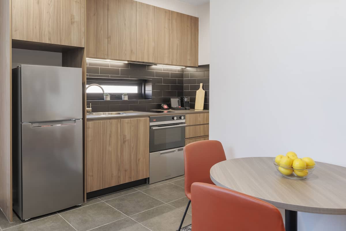 superior one bedroom apartment | private kitchen | full-sized fridge, microwave, oven, stovetop