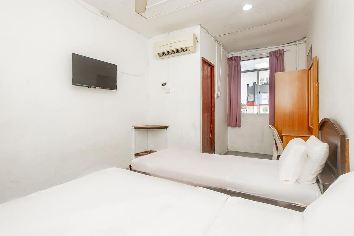Deluxe Triple Room | Bed sheets