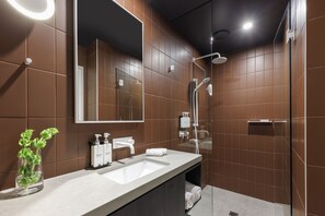 Shower, rainfall showerhead, designer toiletries, hair dryer