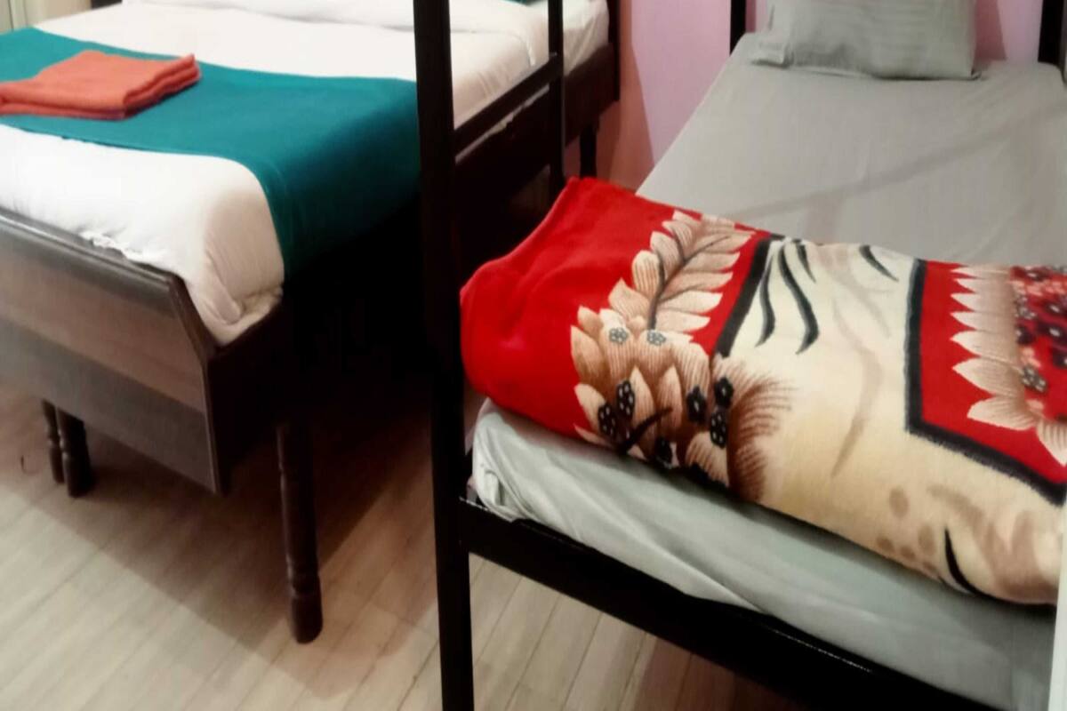 Deluxe Quadruple Room | Bed sheets