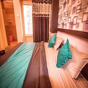 Standard Double Room | Bed sheets - Triple one Hostels and Hotels (Narendranagar)