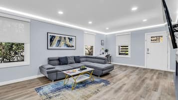 Signature Cottage, 3 Bedrooms, Non Smoking, Terrace | Living room | 55-inch Smart TV with digital channels, TV