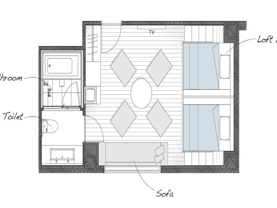 Grundriss eines Hotelzimmers mit Bad, Toilette, Sofa, Fernseher und Schlafkoje.