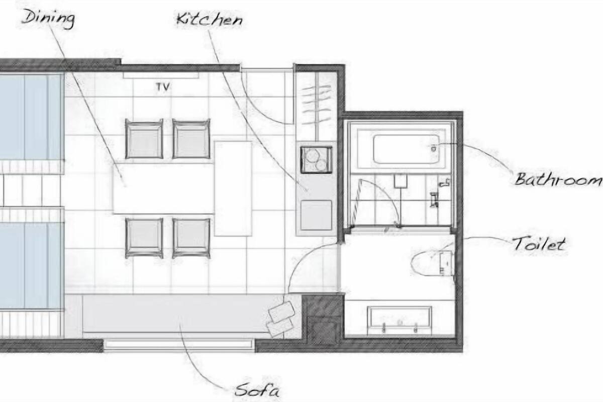 A floor plan with labeled areas including a dining area, kitchen, loft beds, TV, sofa, bathroom, and toilet.