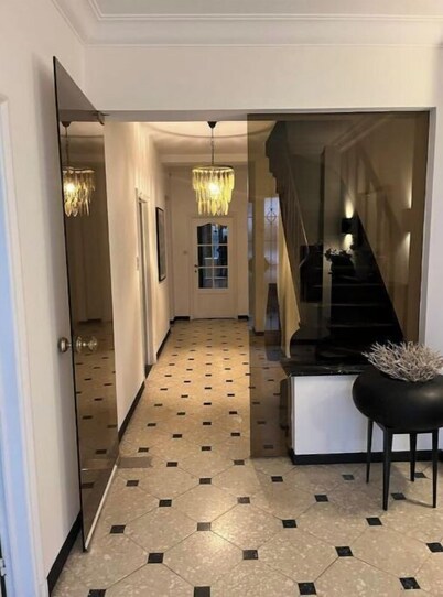 Spacious townhouse with garden and garages