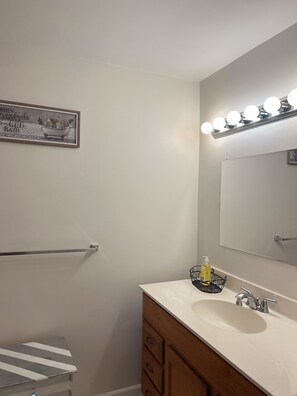 Combined shower/bathtub