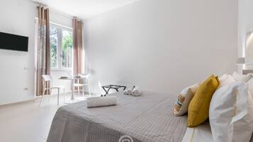 1 slaapkamer, een strijkplank/strijkijzer, wifi, beddengoed